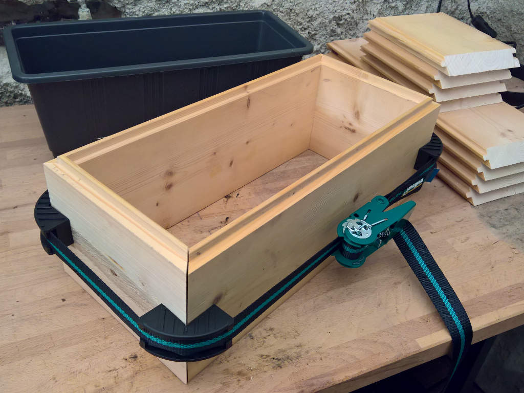 wooden box is clamped together