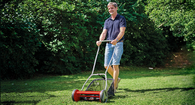 man collects lawn